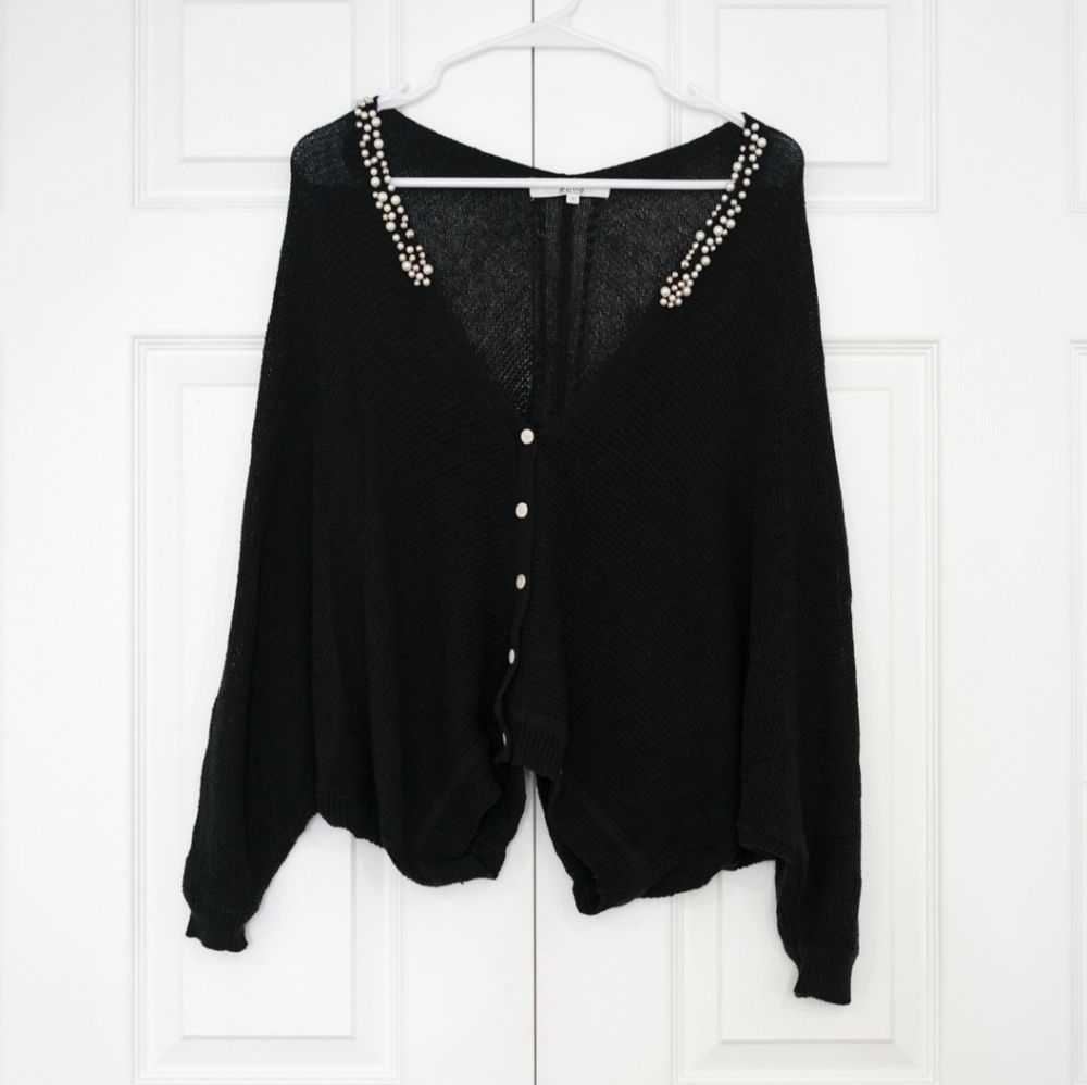 Black sweater with pearls